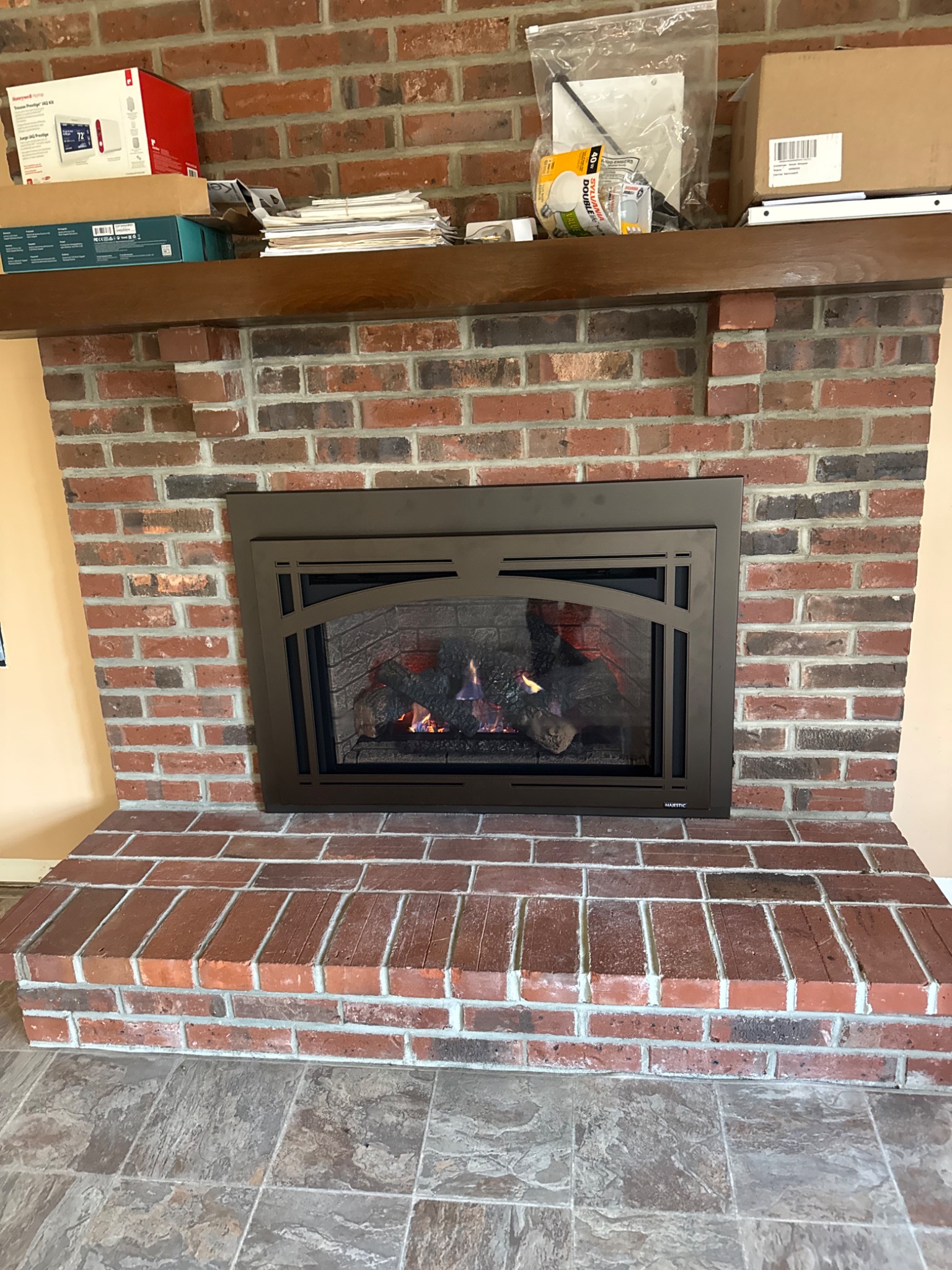 Majestic Trilliant 35 inch gas insert with New Bronze surround and New Bronze Tuscan Arch front