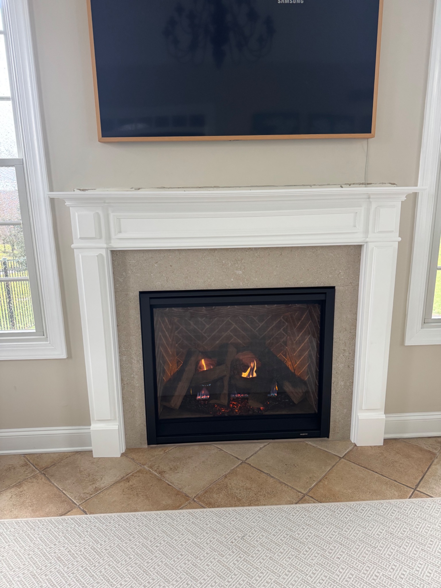 After: Majestic Platinum gas fireplace with new mantel and surround