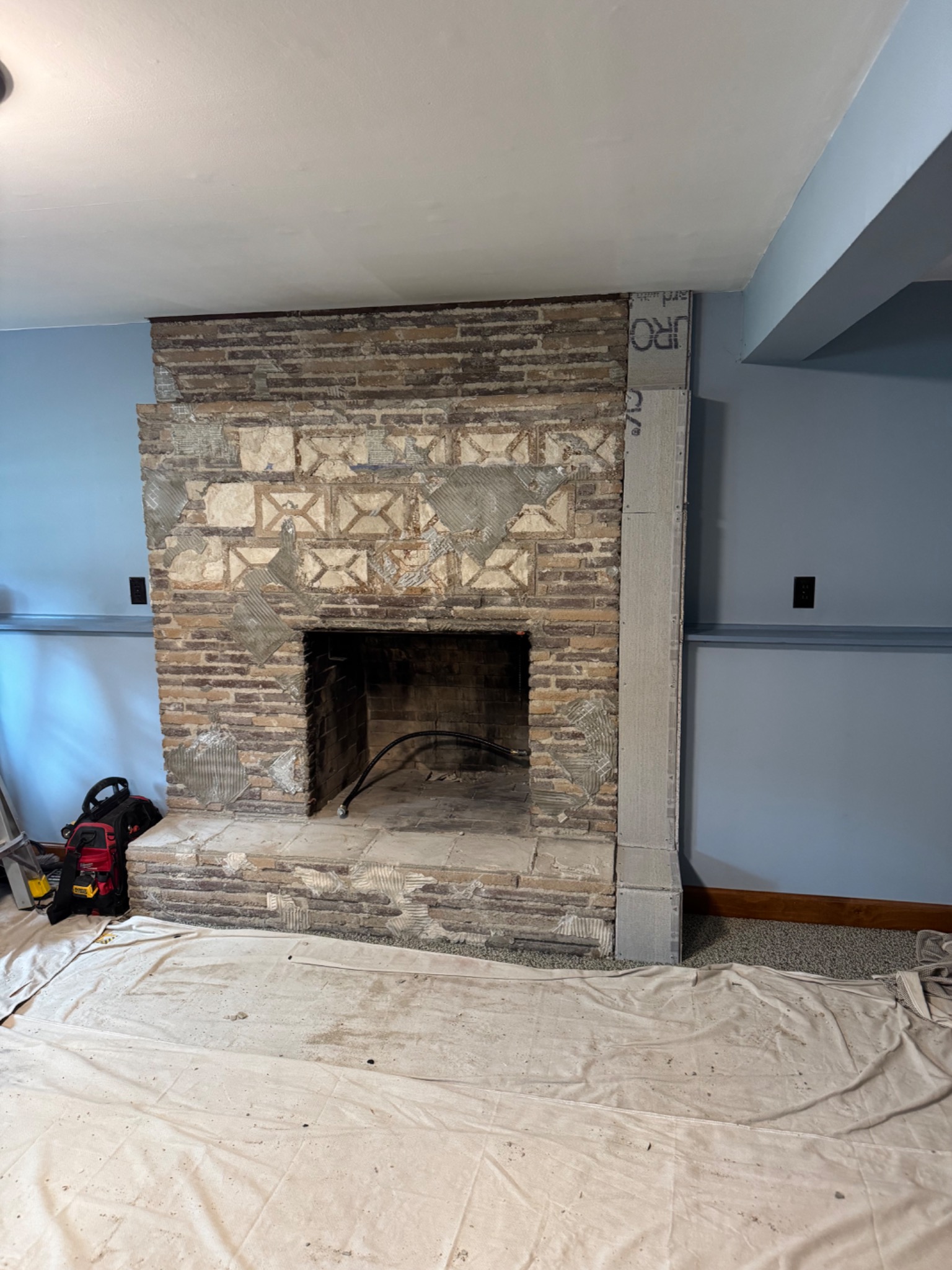 During: fireplace makeover with preparation for insert