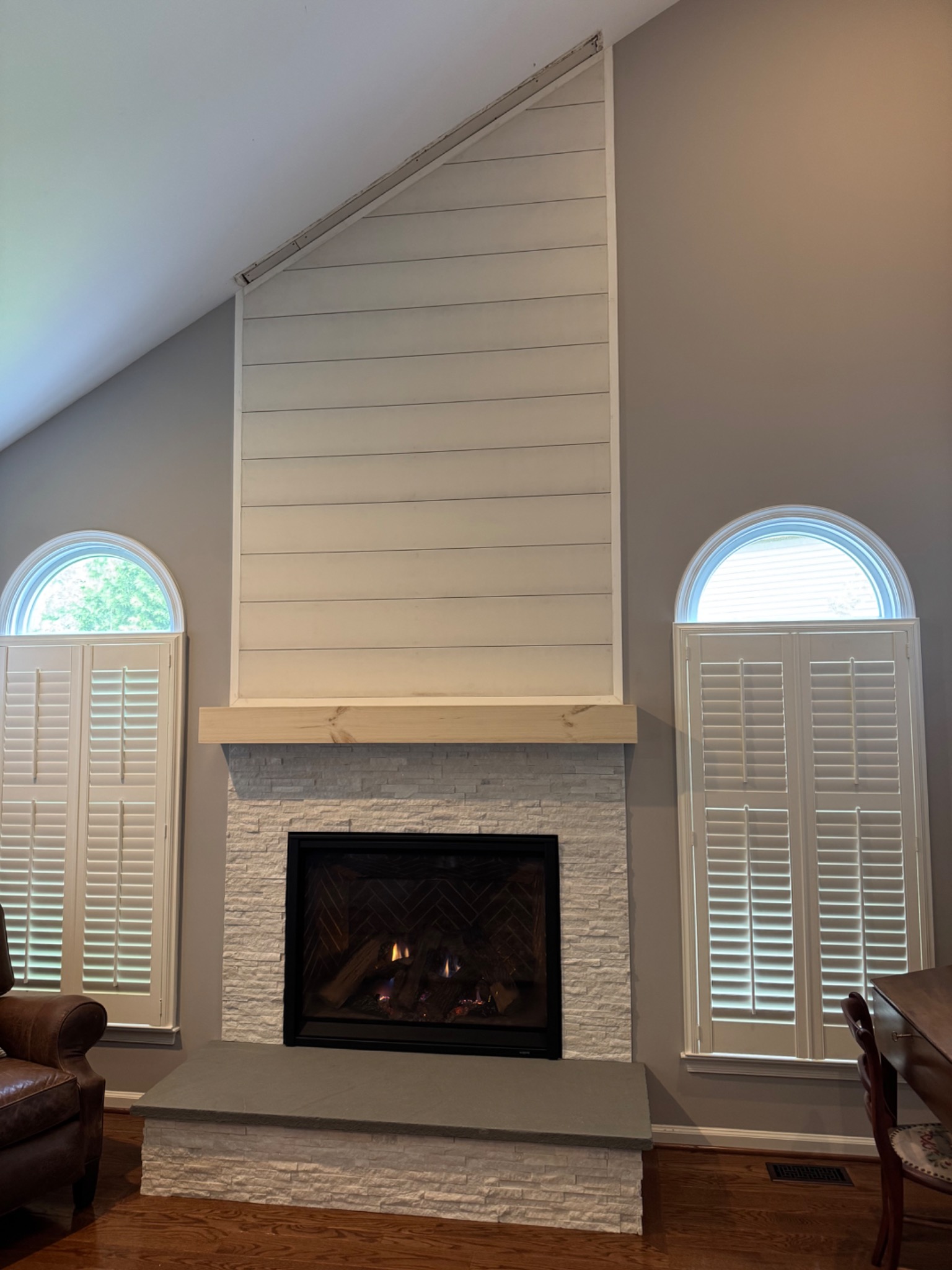 After: Majestic Meridian Platinum gas fireplace with stone, bluestone hearth, mantel, and shiplap